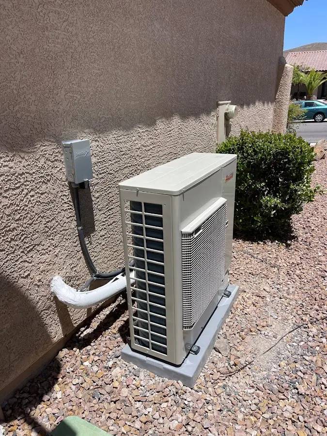 Residential air conditioning condenser unit in East Earl